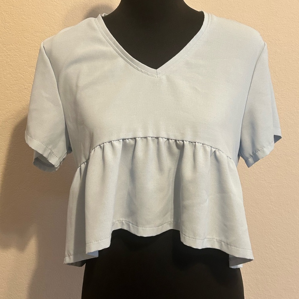 Women’s light blue crop blouse